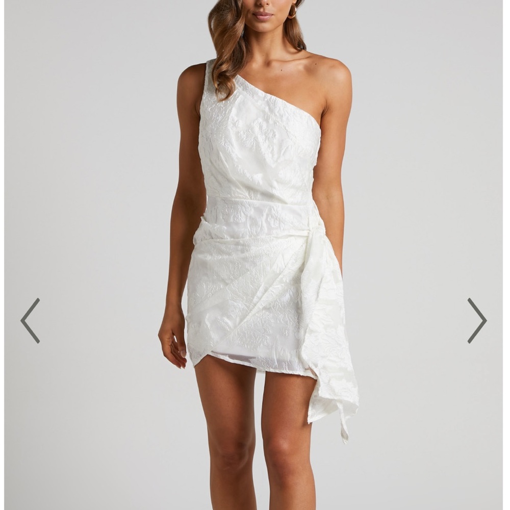 BRAILEY ONE SHOULDER WRAP FRONT MINI DRESS IN WHITE JACQUARD